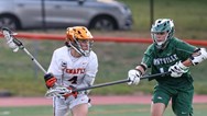 Who were the top boys lacrosse assists leaders at the end of the 2021 season?